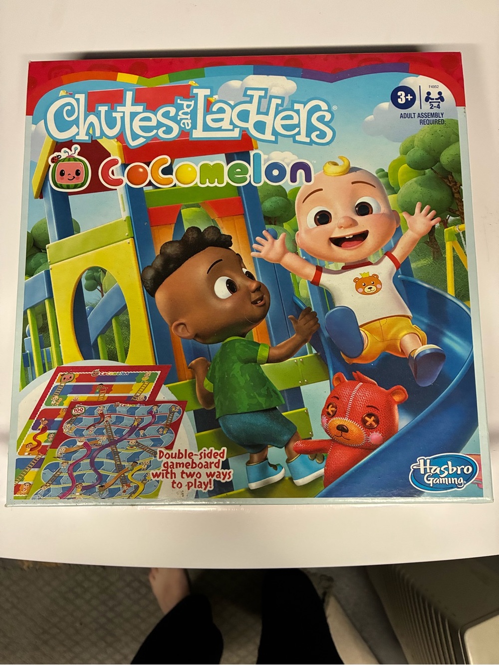 Hasbro Chutes and Ladders Cocomelon Board Game - Blue, Yellow, Green, Red